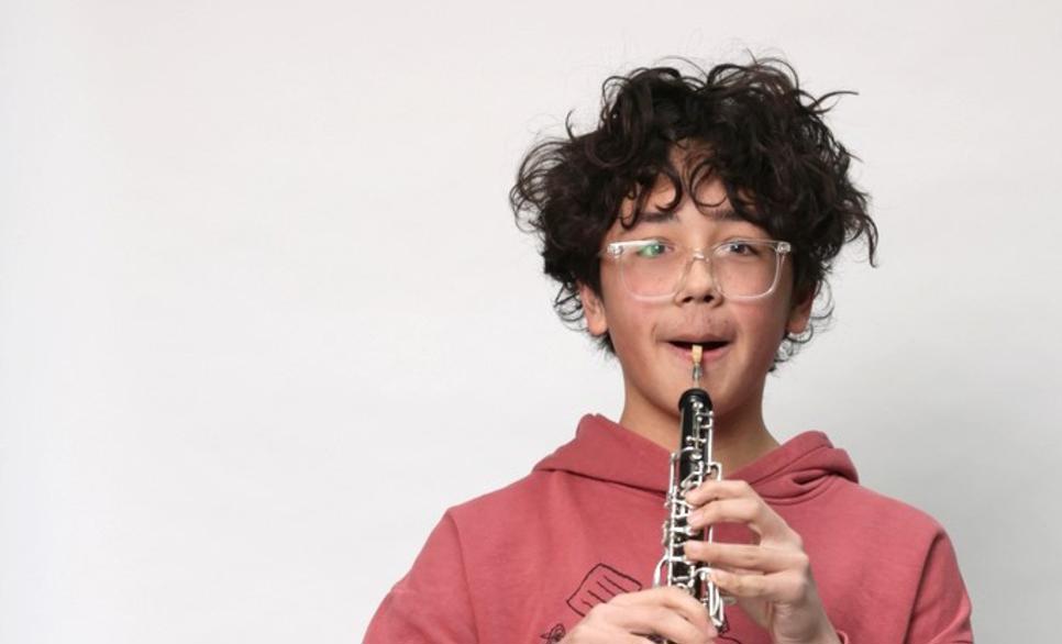 Child playing a clarinet
