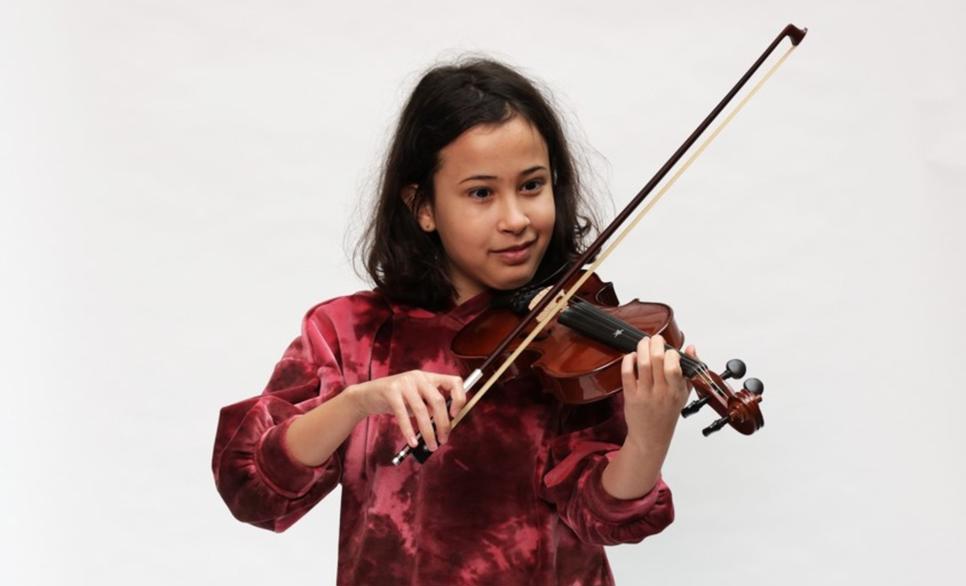 Child playing violin