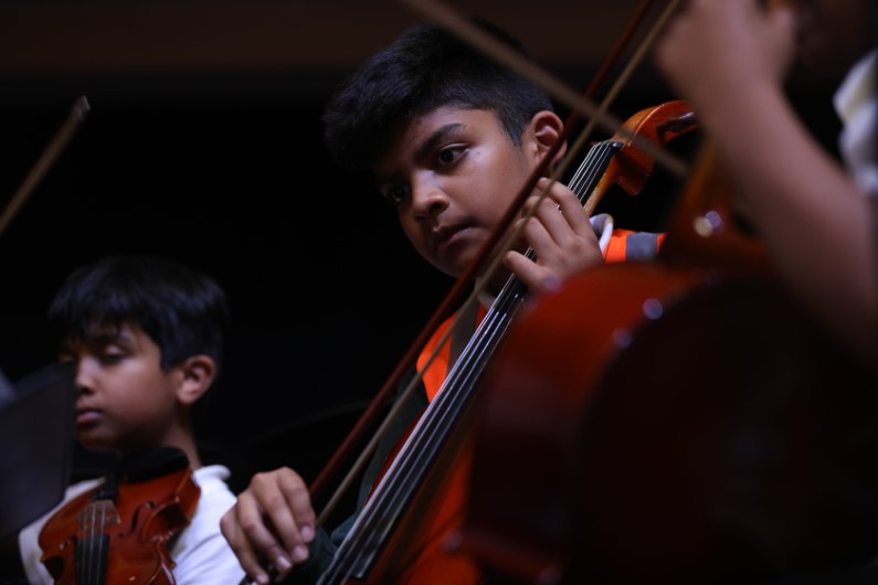 Boy playing cello